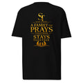 premium heavyweight Stay Tight graphic T-shirt with a gold Christian family design reading “A Family That Prays Together, Stays Together,” featuring a praying family silhouette.