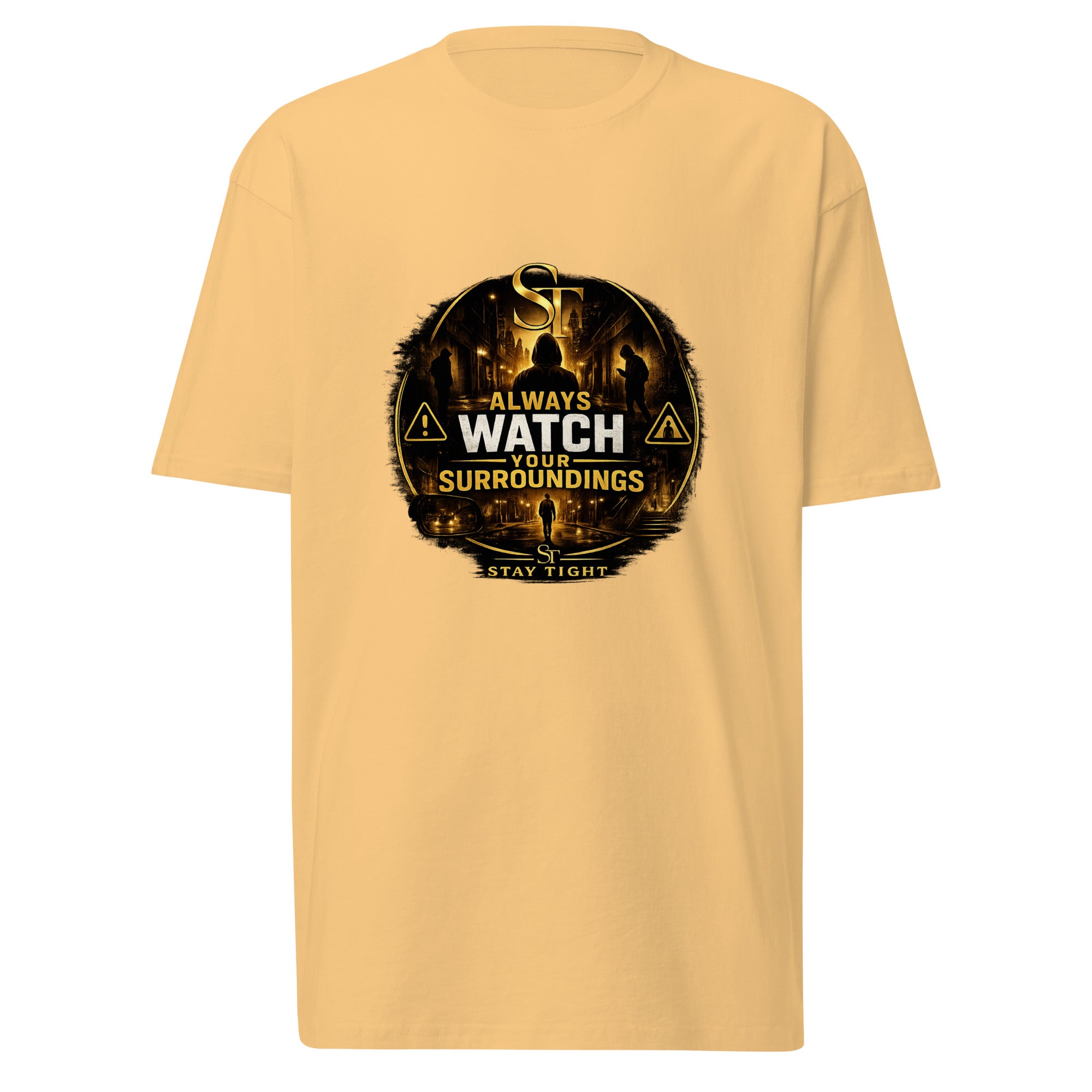 Stay Tight premium heavyweight T-shirt featuring the ST logo, the phrase “Always Watch Your Surroundings,” and a caution-themed graphic with warning symbols and urban silhouettes.
