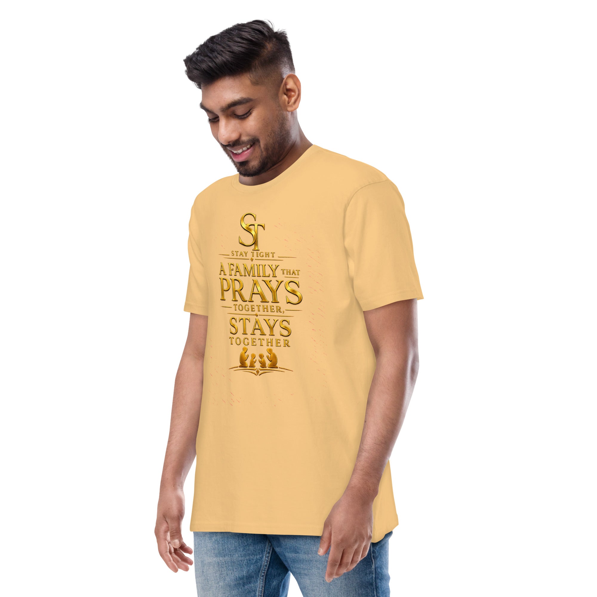 premium heavyweight Stay Tight graphic T-shirt with a gold Christian family design reading “A Family That Prays Together, Stays Together,” featuring a praying family silhouette.