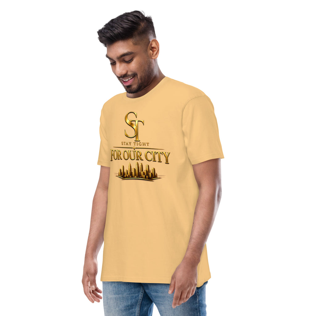 premium heavyweight Stay Tight graphic T-shirt with a gold “For Our City” design featuring a modern city skyline. Inspirational streetwear celebrating community, hometown pride, leadership, and urban culture.