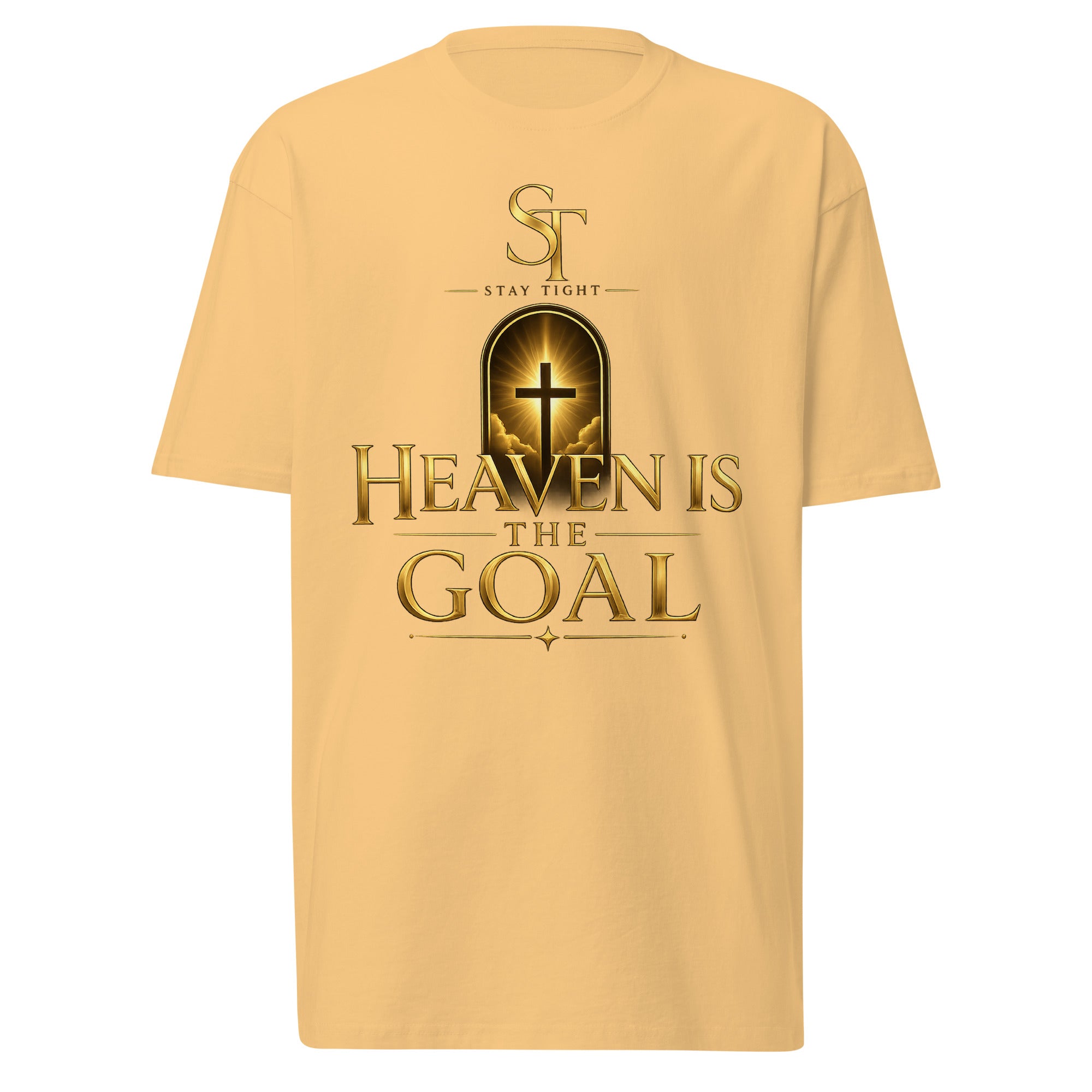 Stay Tight premium heavyweight T-shirt featuring the inspirational Christian message "Heaven Is the Goal" with a glowing cross inside an open doorway above elegant gold typography, symbolizing eternal hope, faith in Jesus Christ, salvation, and living with purpose