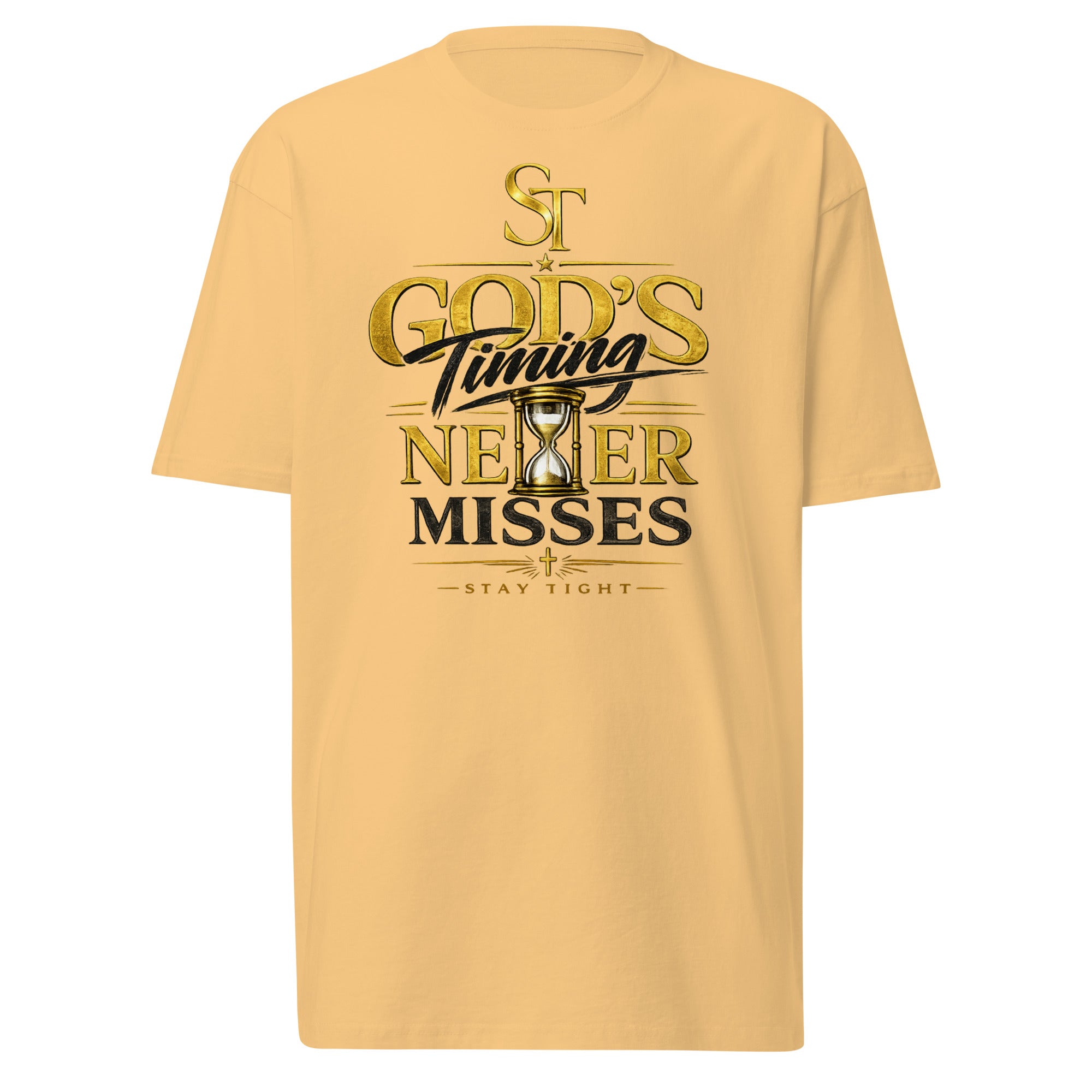 Stay Tight premium heavyweight T-shirt featuring the message "God's Timing Never Misses" with a gold hourglass and cross beneath the ST logo, symbolizing faith, patience, trust in God's perfect timing, and perseverance