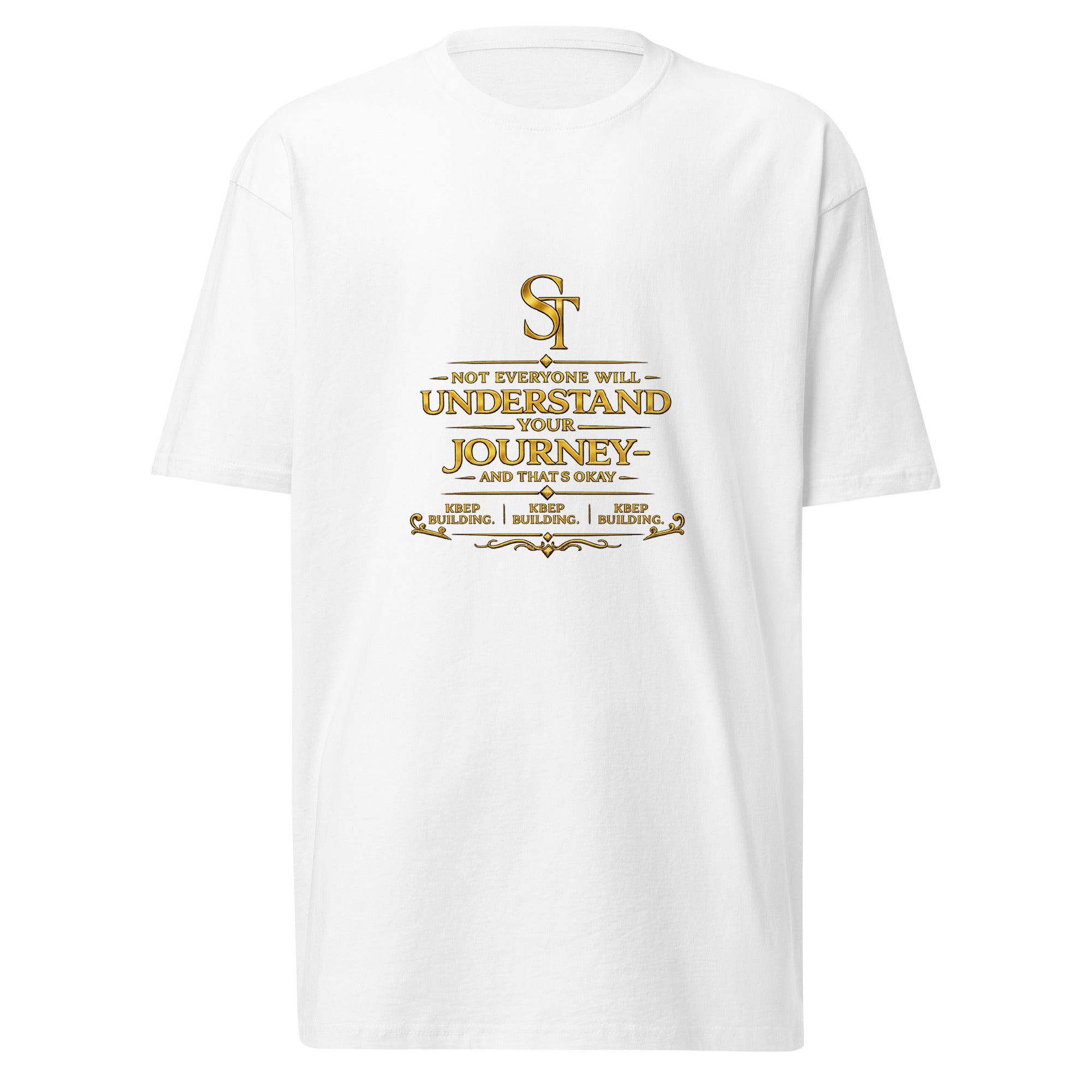 Stay Tight premium heavyweight T-shirt featuring a vintage gold ST logo and the quote “Not everyone will understand your journey, and that’s okay. Keep building.”