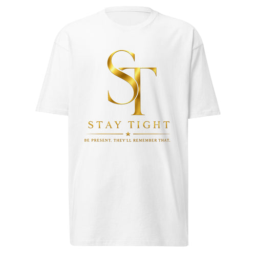 Stay Tight premium heavyweight T-shirt featuring the gold ST logo with the tagline "Be Present. They'll Remember That." in a clean minimalist design